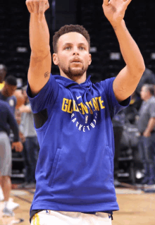 basketball player wearing a blue shirt that says glentyne