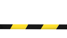 a yellow and black striped tape is against a white background