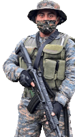 a soldier wearing a face mask holds a rifle