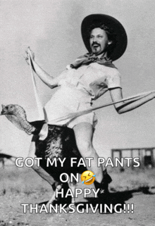 a man in a cowboy hat is riding an ostrich with the caption " got my fat pants on happy thanksgiving !!! "