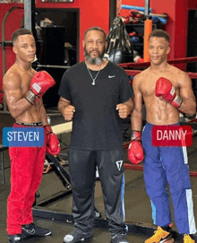 a man stands next to two young men wearing boxing gloves and their names are steven and danny