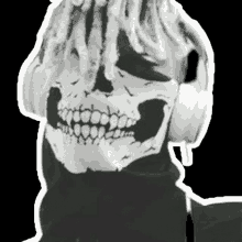 a black and white photo of a person wearing headphones and a skull mask .