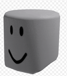 a white cube with a black face on it