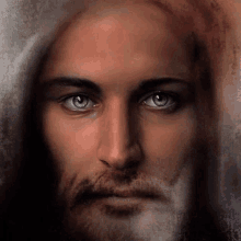 a close up of jesus ' face with blue eyes and a beard