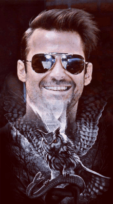 a man wearing sunglasses is smiling while holding an owl