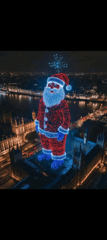 an aerial view of a giant santa claus made out of lights