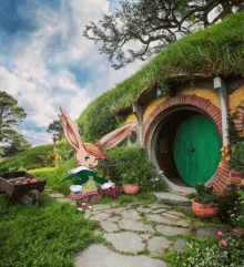 a rabbit is standing in front of a green door