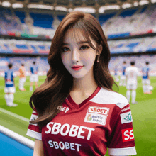 a woman in a soccer jersey that says sbobet