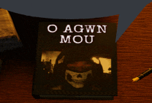 a book called o agwn mou sits on a table