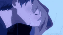 a boy and a girl are kissing in a purple anime .