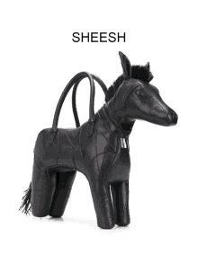 a black horse shaped purse with the word sheesh on the bottom