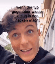 a young man wearing headphones looks at the camera with a caption that says wenn der typ