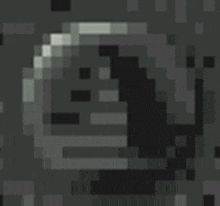 it looks like a pixel art of a skull with a face on it .