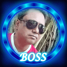 a picture of a man wearing sunglasses and the word boss