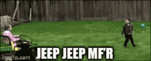 a boy and a girl are playing with a jeep jeep mfr in the grass