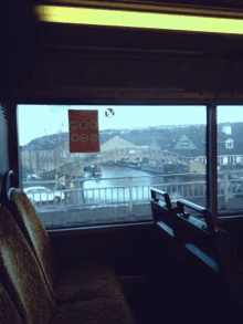 a bus with a sign on the window that says no smoking on it