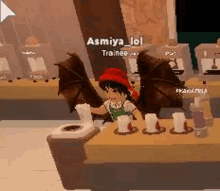 a cartoon character with bat wings is sitting at a table in a video game .