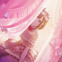 a girl in a pink dress is peeking out of a window