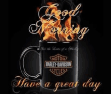 a harley davidson coffee mug with flames coming out of it and the words `` good morning have a great day ''