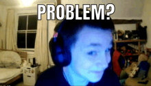 a man wearing headphones looks at the camera with the words problem above him