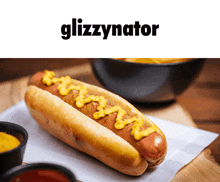 a hot dog on a bun with mustard and ketchup next to a glizzynator logo