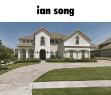 a large white house with the word ian song on the top