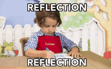 a young boy wearing a red apron with the name lucas embroidered on it