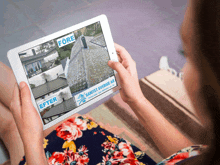 a woman is holding a tablet that shows a before and after picture