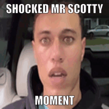 a man with a shocked look on his face and the words shocked mr scotty moment below him