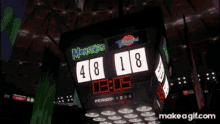 a scoreboard that says monsters and tune squad