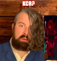 a man with a beard and long hair has the word kcr on his head