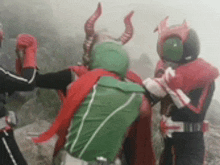 a group of masked riders are fighting each other in a foggy forest .