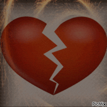 a picture of a broken heart with a lightning bolt coming out of it