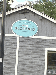 a building with a sign that says fresh local blondies