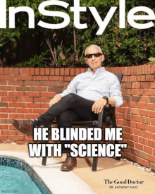 a man sits in a chair next to a pool on the cover of instyle