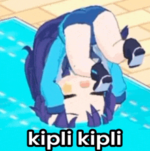 a cartoon character is laying upside down in a pool with the words kipli kipli in the bottom right corner