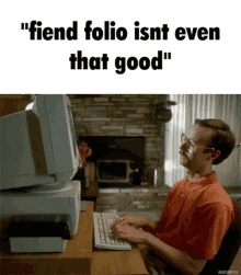 a man is typing on a computer with the words " fiend folio isn't even that good "