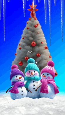 three snowmen standing in front of a christmas tree with the letters a.c. below them