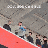 a group of people are standing in a room with the words pov sos de agus written on the bottom