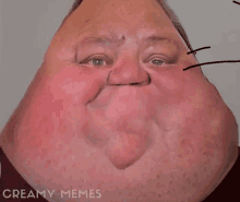 a close up of a man 's face with the words creamy memes on the bottom