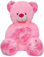 a pink teddy bear with a heart on its feet