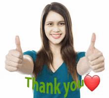 a woman is giving a thumbs up with the words thank you written on her shirt