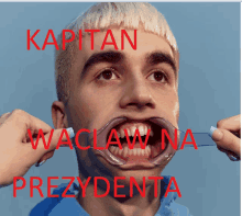 a man with a mouth open and the words kapitan waclaw na prezydenta on the bottom