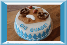 a cake that says ois guade on top of it