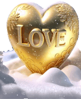 a gold heart that has the word love on it