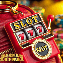 a keychain of a slot machine with the words slot written on it