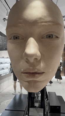 a close up of a mannequin 's face with a camera on it