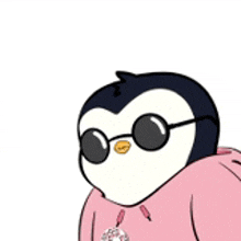 a penguin is wearing a pink hoodie and sunglasses .