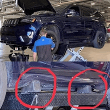 a jeep is being worked on in a garage with the hood open