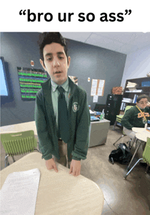 a boy in a green jacket and tie is standing in front of a table with the words " bro ur so ass " on the bottom